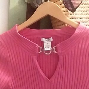 A pretty light in color pink fitted tight top